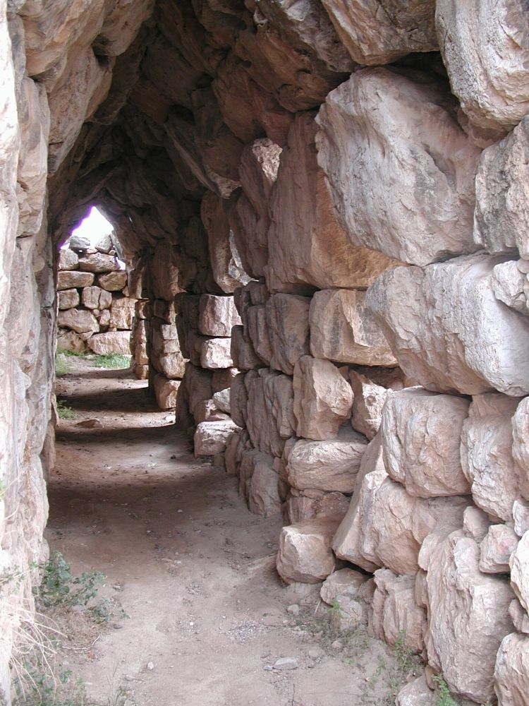 <p><span>architects refer to these roughly cut blocks of stone as <strong>"Cyclopean masonry."</strong></span></p><p><span>While the king’s palace must have certainly been lavish (and there isn’t hardly anything remaining), most of the energy of this citadel certainly was on defense.&nbsp; The Minoans didn’t worry about constructing a huge wall around their palaces, </span><em>but the Mycenaeans did.</em></p>