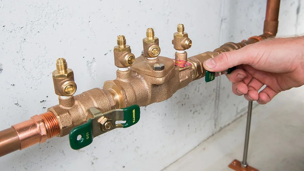 <p>Backflow Preventer</p><p class="has-focus"><span>A backflow preventer is a vital plumbing safety device that stops contaminated water from reversing direction and mixing with clean public or residential drinking supplies. Common types include dual check valves, double check valve assemblies, and reduced pressure zone (RPZ) devices.</span></p>