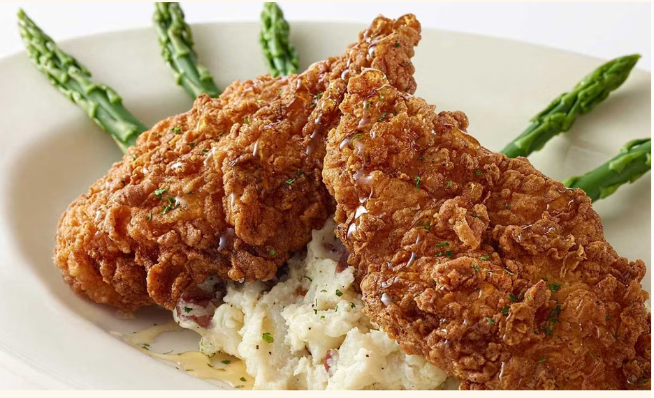 <p>Fried Chicken Breast with Truffle-Honey, Asparagus and Mashed Potatoes</p>