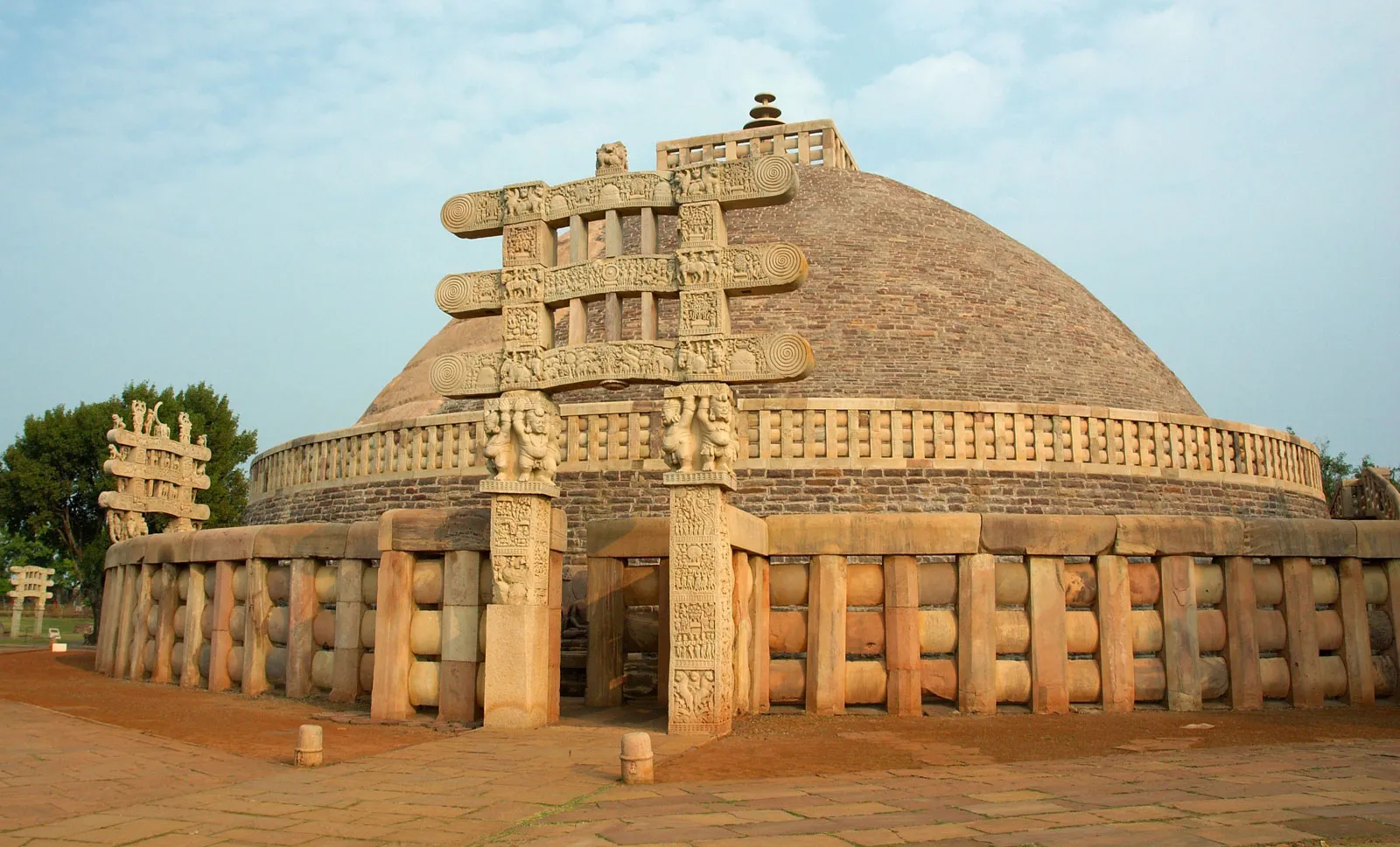 <p>A dome-shaped Buddhist monument serving as a commemorative structure or reliquary; consists of anda (dome), harmika, yashti, and chhatra</p>