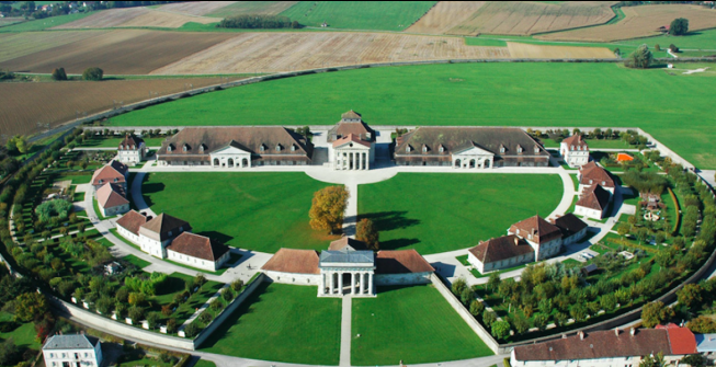 <p>Main buildings colums are cut into  different round stones to mimic how old greecian columns were built before carving. Only half built and serving as a utopian saltwork mine</p>