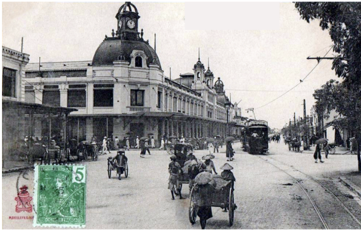 <p><span style="background-color: transparent;">This postcard shows the colonial urban landscape of Hanoi under French rule in French Indochina. The boulevard represents European-style urban planning imposed on a Southeast Asian city. Colonial authorities redesigned parts of the city with wide streets, administrative buildings, and segregated districts. The image highlights how colonialism reshaped urban space to serve imperial power through exhibition, and economic extraction.</span></p>