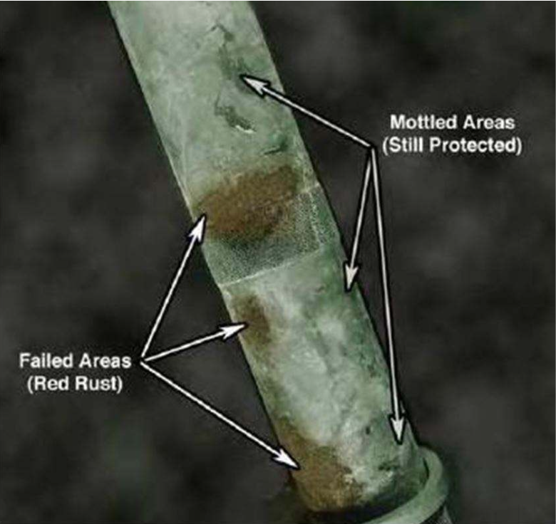 <p>White-to-brown-to-black mottling. Mottling and cracking still indicates the cadmium is performing its protective anodic function.</p>