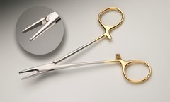 <p>Holding small suture needles during delicate procedures</p>