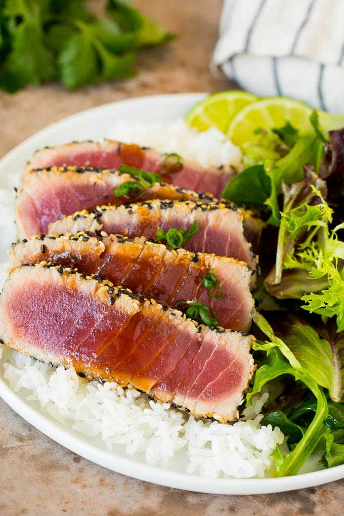 <p>Blackened Ahi Tuna, Red Onion, Cucumber, Heirloom Tomatoes, Feta Cheese, Crispy Wontons, Wasabi Aioli, and Soy-Lime Vinaigrette</p>