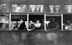 <p><br>Robert Frank is identifiable through gritty, spontaneous black-and-white documentary photography, especially <em>The Americans</em>. His images feel raw, grainy, and emotionally detached, often using tilted horizons, blur, and unconventional framing. He focuses on everyday American life—cars, diners, isolation—emphasizing social tension, alienation, and a critical outsider perspective. </p>