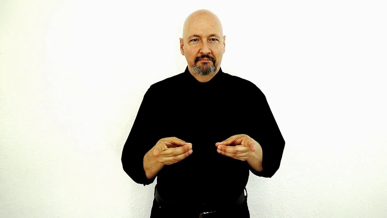 <p>“D” hands horizontal to ground, tap twice</p>