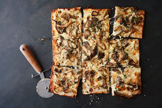 <p>No morels, but loads of fungi's. A white pizza with our garlicky white cheese sauce, a mix of mushrooms (maitakes, trumpet royales, and oyster mushrooms), roasted shallots, fontina cheese and fresh mozzarella.</p><p>Guests can select if they would like it sliced or not sliced</p><p>Modification options: None</p><p>Allergens: Dairy, Garlic</p>