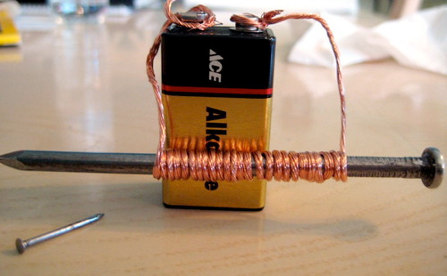 <p>A material made of iron that acts as a magnet when an electric current is passed through it.</p>