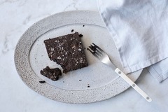 <p>Dark chocolate, cacao, almond flour, and sea salt</p><p>Modifications: none</p><p>Allergens: Tree nuts (almond), Egg</p>