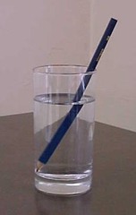 <p>The bending of a wave as it passes at an angle from one medium to another</p>