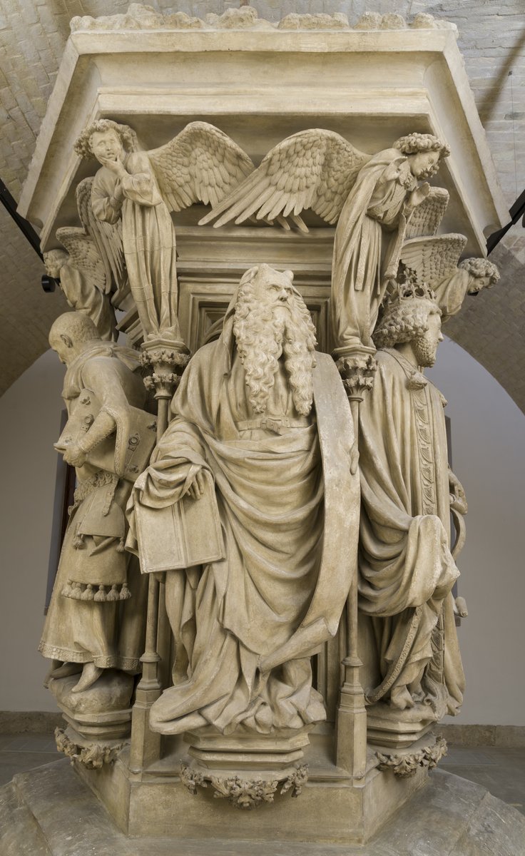 <p>Artist:<br>Title:<br>Period/movement:<br>Format:<br>Material/medium:<br><br><strong>Artist:</strong> Claus Sluter<br><strong>Title:</strong> <em>Well of Moses</em><br><strong>Period/movement:</strong> 14th/15th Century Flemish<br><strong>Format:</strong> Monumental well-base/pedestal for a Crucifixion group<br><strong>Material/medium:</strong> Limestone with traces of paint <strong>Human problem/function:</strong> The prophets connected Hebrew scripture to Christian doctrine and made that interpretive lineage physically authoritative in a monastic setting.</p><p><strong>Zone 2 — See and decode it</strong></p><p class="code-line"><strong>Recognition clues:</strong></p><ol><li><p>Moses has hornlike rays and tablets</p></li><li><p>Individualized elderly prophet</p></li><li><p>Massive body and deeply folded cloak <strong>Visible evidence:</strong> Deep carving creates forceful shadows and physical authority.<br><strong>Psychology/attention:</strong> Size, age, texture, facial individuality, and compressed energy activate authority heuristics before the viewer reads the figure's attribute.</p></li></ol><p><strong>Zone 3 — Connect and explain it</strong></p><p class="code-line">Sluter replaces courtly elegance with monumental individuality. The prophets make scriptural authority feel physically and emotionally present within a Burgundian religious institution. <strong>Portable insight:</strong> Abstract authority becomes more persuasive when embodied in a distinctive, emotionally legible person.</p><p><strong>Zone 4 — Study references</strong></p><p class="code-line"><strong>Note-taking guide:</strong> The Chapter 20 guide emphasizes monumental Burgundian sculpture and individualized physical authority. Deep carving, weight, age, and the twisting cloak make the prophet commanding.<br><strong>Worksheet:</strong> Chapter 20, Question 4: Moses is identified by tablets and hornlike rays. The horns come from a Latin interpretation of the biblical description of his radiant face.</p>