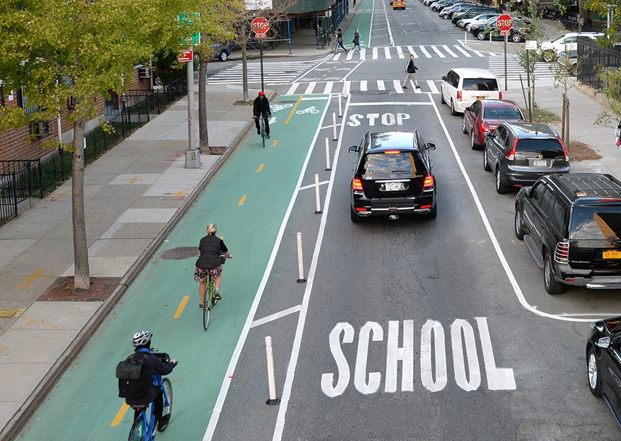 <p>It is illegal to drive in a bicycle lane except if you’re turning & within how many feet of an intersection?</p>