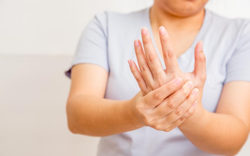 <p>Lacking physical sensation or feeling; often depicted with an image of someone touching something cold or unresponsive.</p>