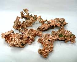 <ul><li><p>Metallic copper color</p></li><li><p>Common green tarnish</p></li></ul><p></p>