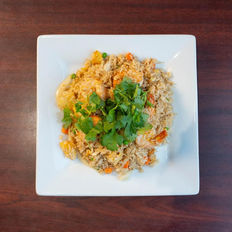 <p>fried rice w/ pineapple, peas, carrot, onion</p>