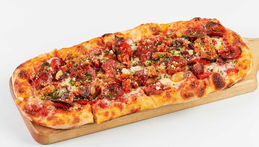 <p>italian sausage, pepperoni, bacon, calabrian chiles with mozzarella, vodka sauce, parmesean, honey</p>