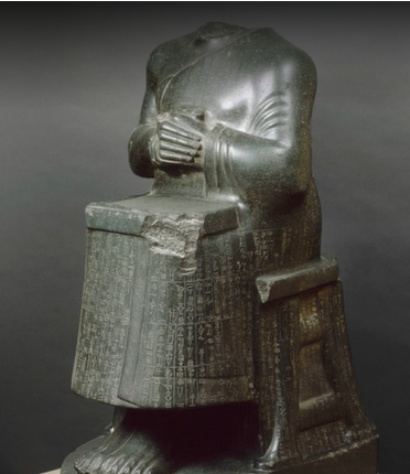 <p>Gudea with a temple plan</p>