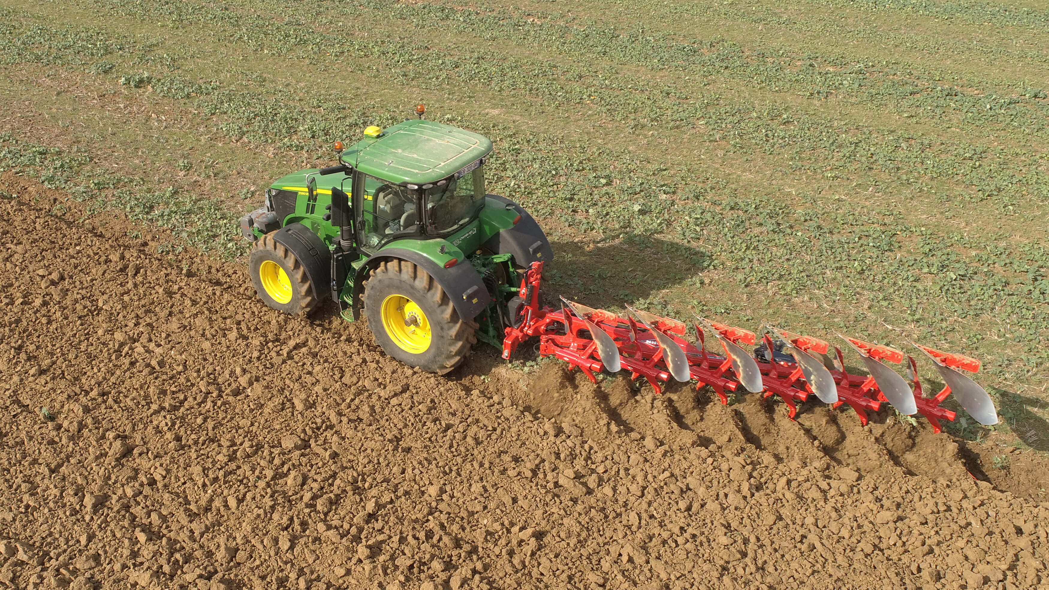 <p>ploughing a field</p>