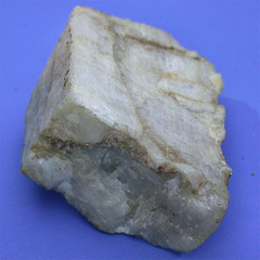<p>white to blue-gray, good cleavage at almost 90</p>