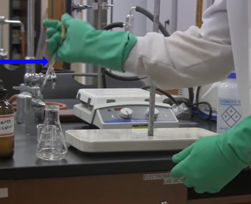 <p>What is being placed here?</p><p>&nbsp;</p><p>A. 10mL of sodium bicarbonate</p><p>B. 20 drops of acetic acid</p><p>C. 20mL of acetic acid</p><p>D. 30 drops of iodine</p>