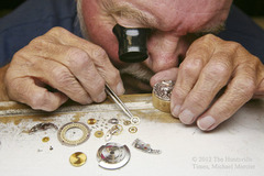 <p>with extreme care and in great detail</p>