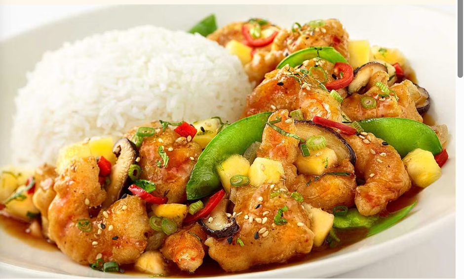 <p>Crispy Chicken and Shrimp with Snow Peas, Mushrooms, Onions, Garlic, Peppers and Cilantro in a Sweet and Spicy Sauce. Served with White Rice</p>