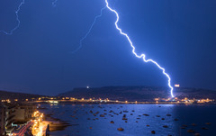 <p>A consequence of static charge building up in the clouds. Lightning strikes are caused by the discharge of this charge.</p>