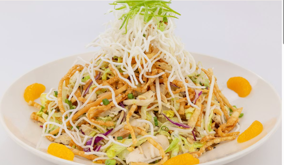 <p>Chicken Breast, Rice Noodles, Lettuce, Green Onions, Almonds, Crisp Wontons, Bean Sprouts, Orange and Sesame Seeds. Tossed in Our Special Chinese Plum Dressing</p>