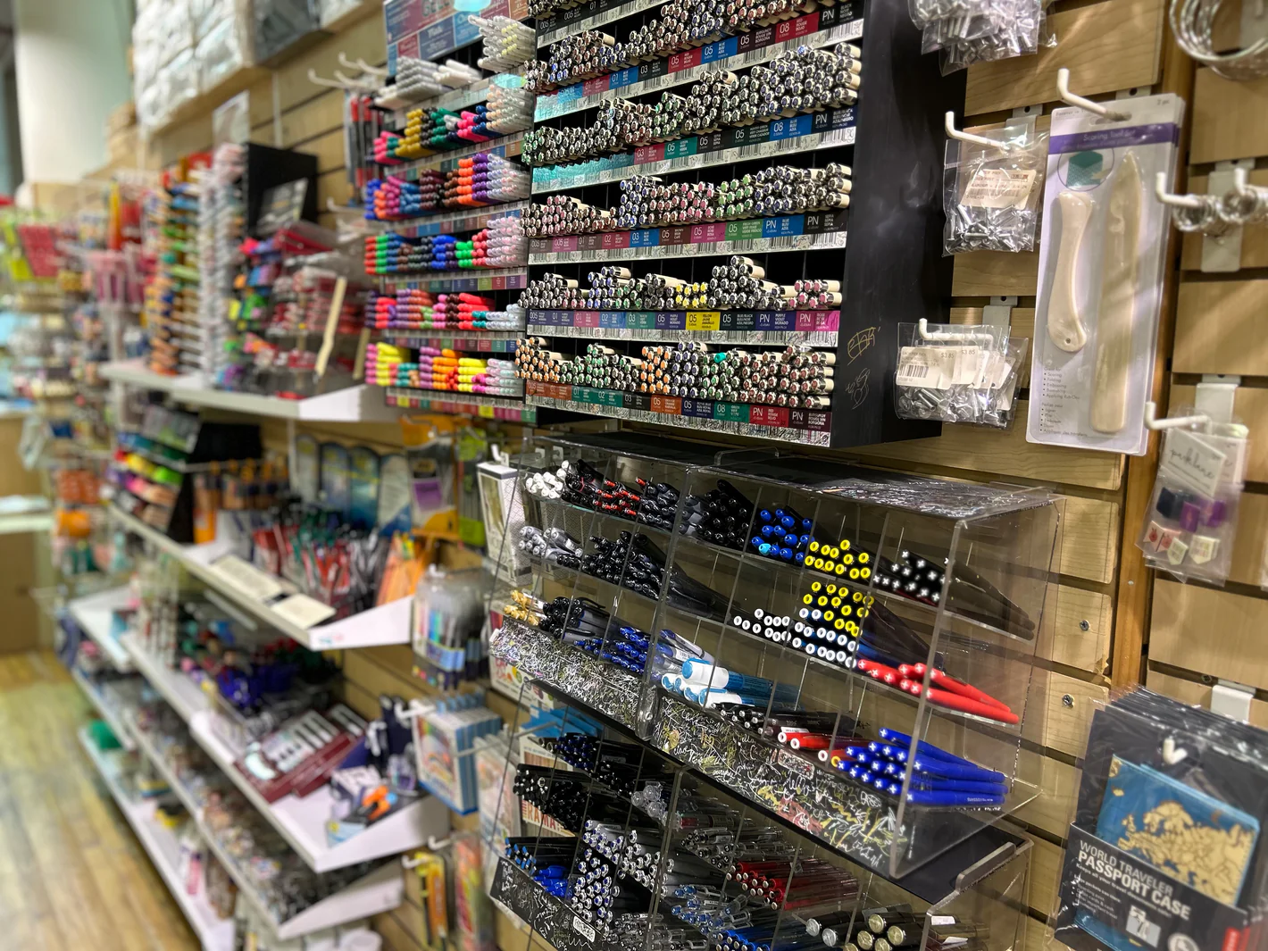 <p>I buy pens at the <strong>stationery store</strong>.</p>