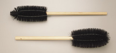 <p>bristles with a wire handle used to scrub glassware</p>