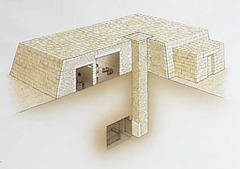 <p>an ancient Egyptian mudbrick tomb with a rectangular base and sloping sides and flat roof</p>
