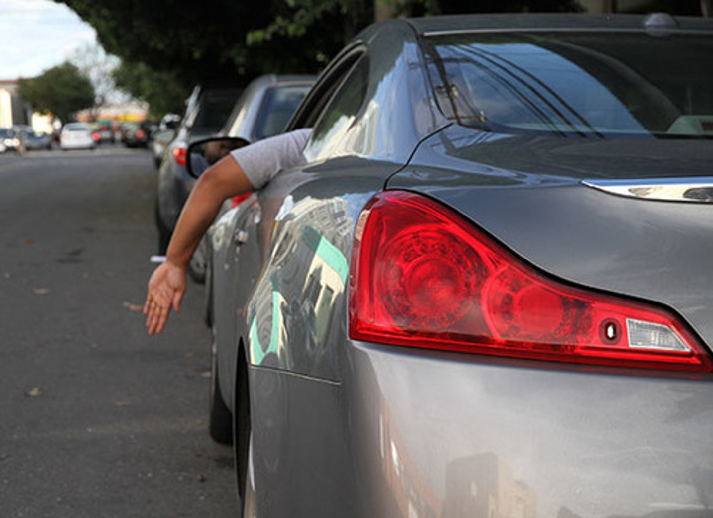 <p>59. The driver's left arm and hand are extended downward. This hand signal means that the driver plans to</p><p>A. Start up.</p><p>B. Stop.</p><p>C. Turn right.</p><p>D. Turn left.</p>