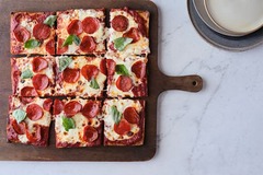 <p>Pepperoni, Basil, pomodoro sauce, fresh mozzarella, fontina cheese.</p><p>*guests can decide whether sliced or not*</p><p>Modifications: no cheese</p><p>Allergens: dairy, garlic</p>