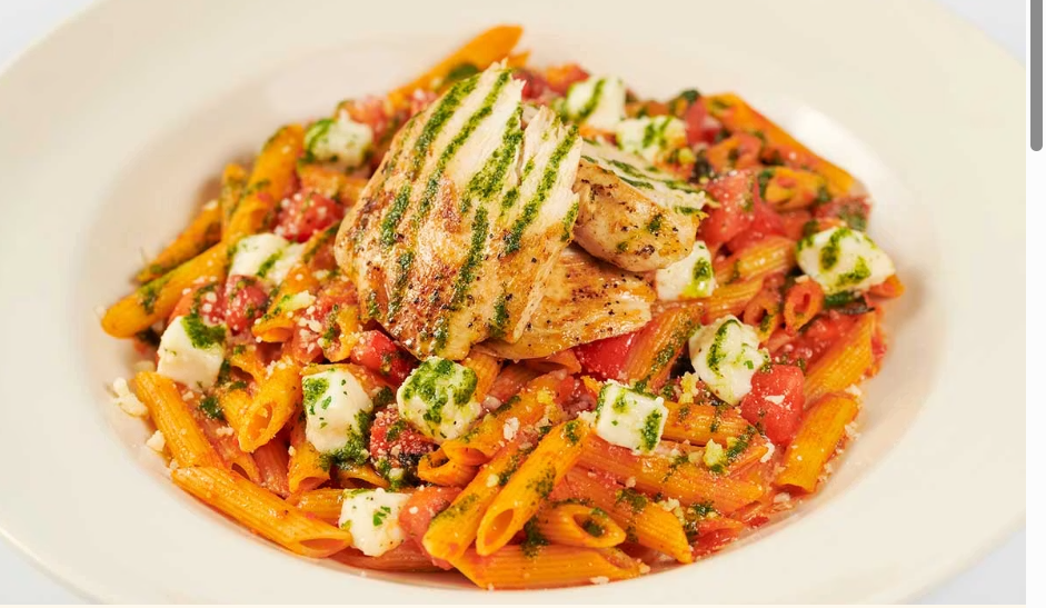 <p>Grilled Chicken, Fresh Mozzarella, a Touch of Garlic and Penne Pasta. Light and Fresh</p>