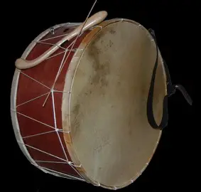 <ul><li><p>Sazdohol ensemble</p></li><li><p>large double headed drum</p></li><li><p>played with malets</p></li></ul><p></p><p></p>