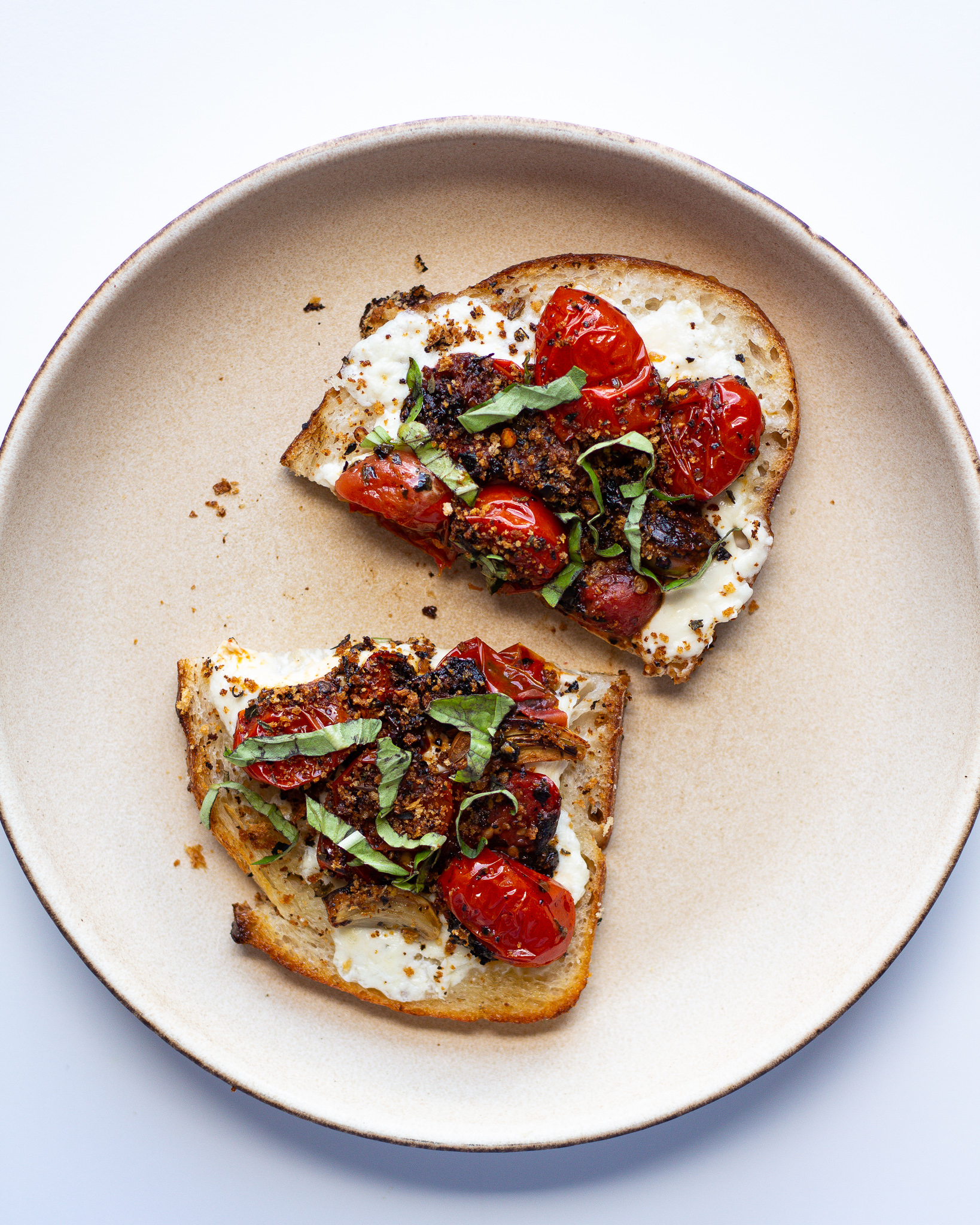 <p>Mozzarella Burrata, Basil PESTO, Olive Oil, Tomatoes, Toasted Ciabatta, and Balsamic Reduction</p>