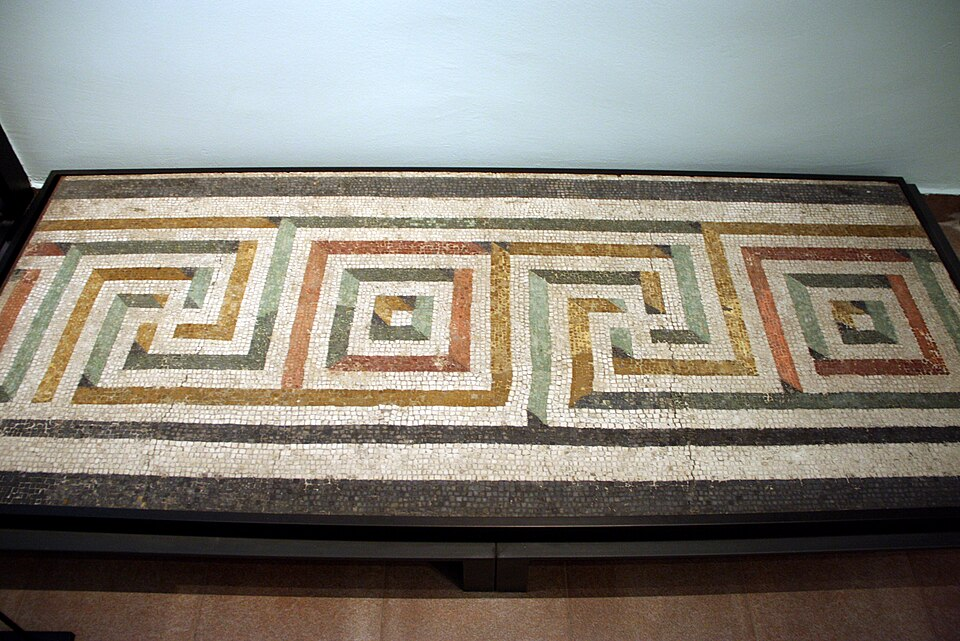 <p>decorative border constructed from a continuous line, shaped into a repeated motif</p>
