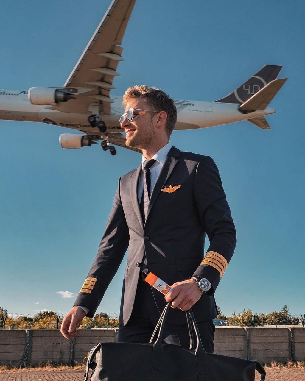 Pilots t______ a l___ because they fly to different countries.