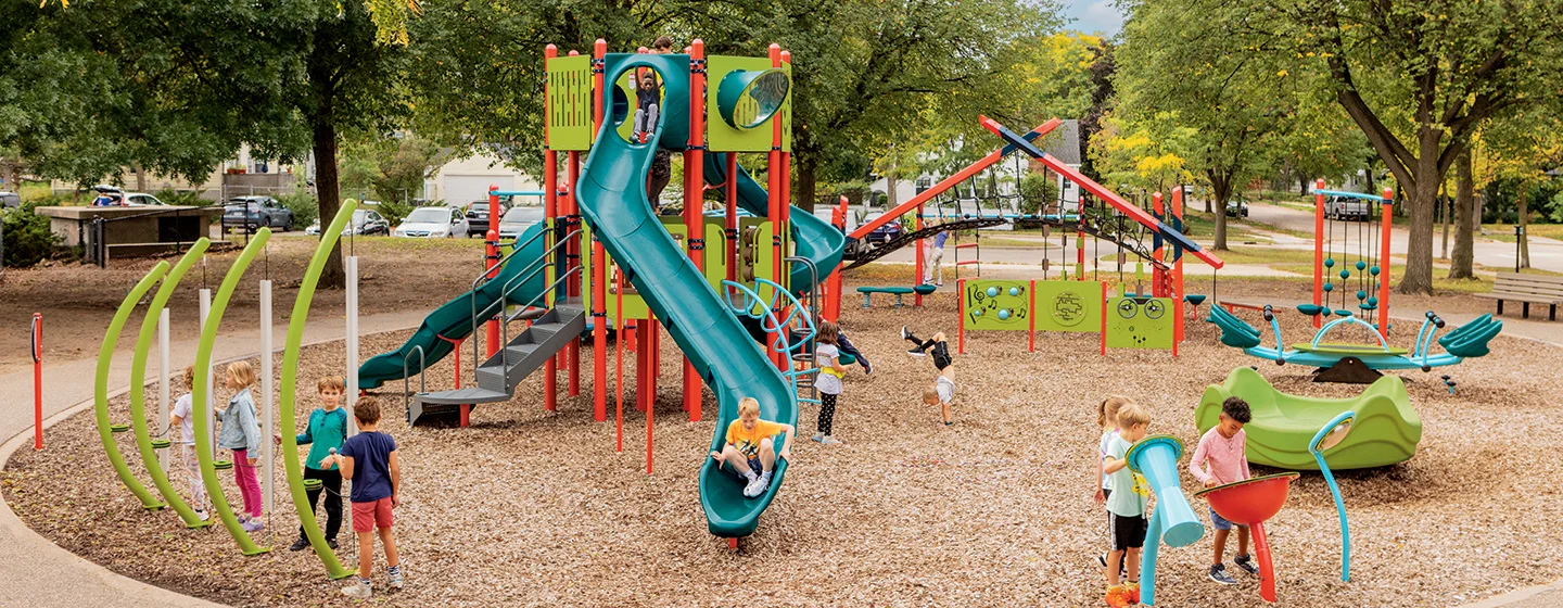 <p>The kids are laughing at the <strong>playground</strong>.</p>
