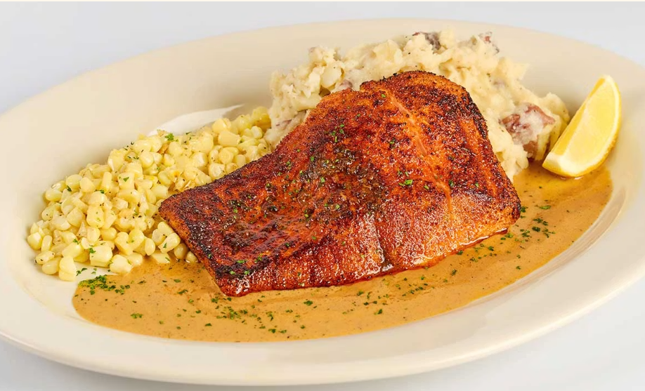 <p>A Louisiana Classic, Blackened with Creole Sauce, Mashed Potatoes and Buttered Corn</p>