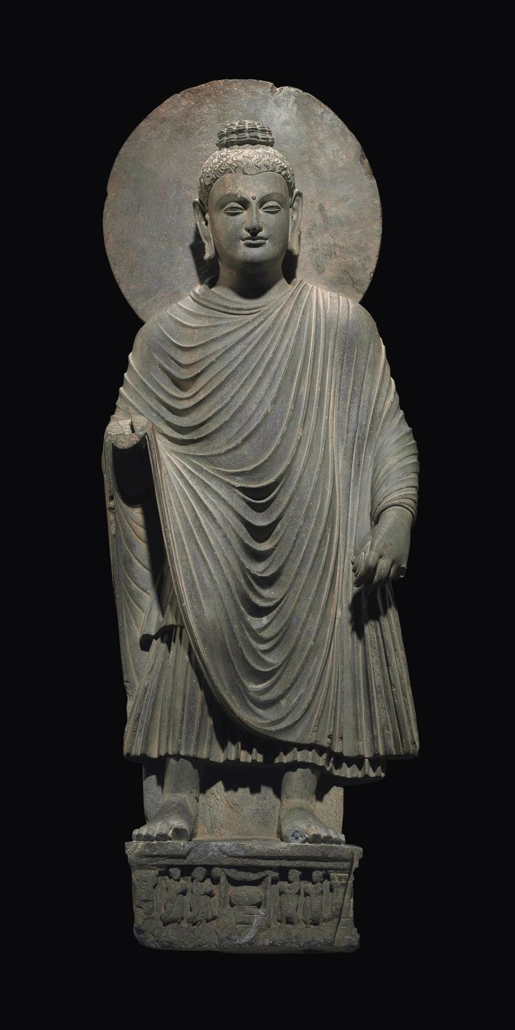 <p>Consistent iconography developed with the monk’s robe draped over the left shoulder, golden skin, long arms</p>