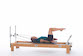 <p><strong>Setup</strong></p><ul><li><p>Starting in Extension Position (page 63)</p></li><li><p>Resistance: light to medium | <strong>Springs: 1B or 1R</strong></p></li></ul><p><strong>Movement</strong></p><ul><li><p>Exhale: Lower arms to sides of body, rotate arms, palms face body</p></li><li><p>Inhale: Open arms to T position, lift arms perpendicular to floor, return to start position</p></li></ul><p><strong>Muscle Focus</strong></p><ul><li><p>Shoulder extensors</p></li><li><p>Shoulder adductors</p></li><li><p>Scapular stabilizers</p></li><li><p>Spinal flexors</p></li><li><p>Hip flexors</p></li></ul><p><strong>Objectives</strong></p><ul><li><p>Shoulder extensor control</p></li><li><p>Shoulder adductor control</p></li><li><p>Scapular stabilization</p></li><li><p>Trunk stabilization</p></li></ul><p><strong>Cues</strong></p><ul><li><p>Maintain scapular stabilization</p></li><li><p>Keep trunk and legs stable</p></li><li><p>Keep movement fluid</p></li></ul><p></p>