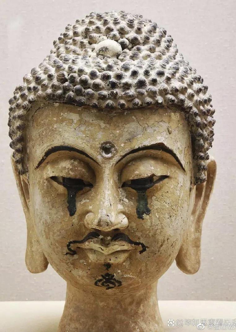 <p>weeping buddha head</p>