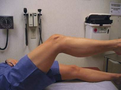 <p><span>The picture below represents a patient attempting to perform a straight leg raise.&nbsp; This patient has some quadriceps weakness and is unable to maintain the knee in an extended position while performing the straight leg raise.&nbsp; Fully extending the knee through terminal knee extension places large demands on the quadriceps.&nbsp; This inability to maintain the knee in full extension during a straight leg raise is known as:</span></p>