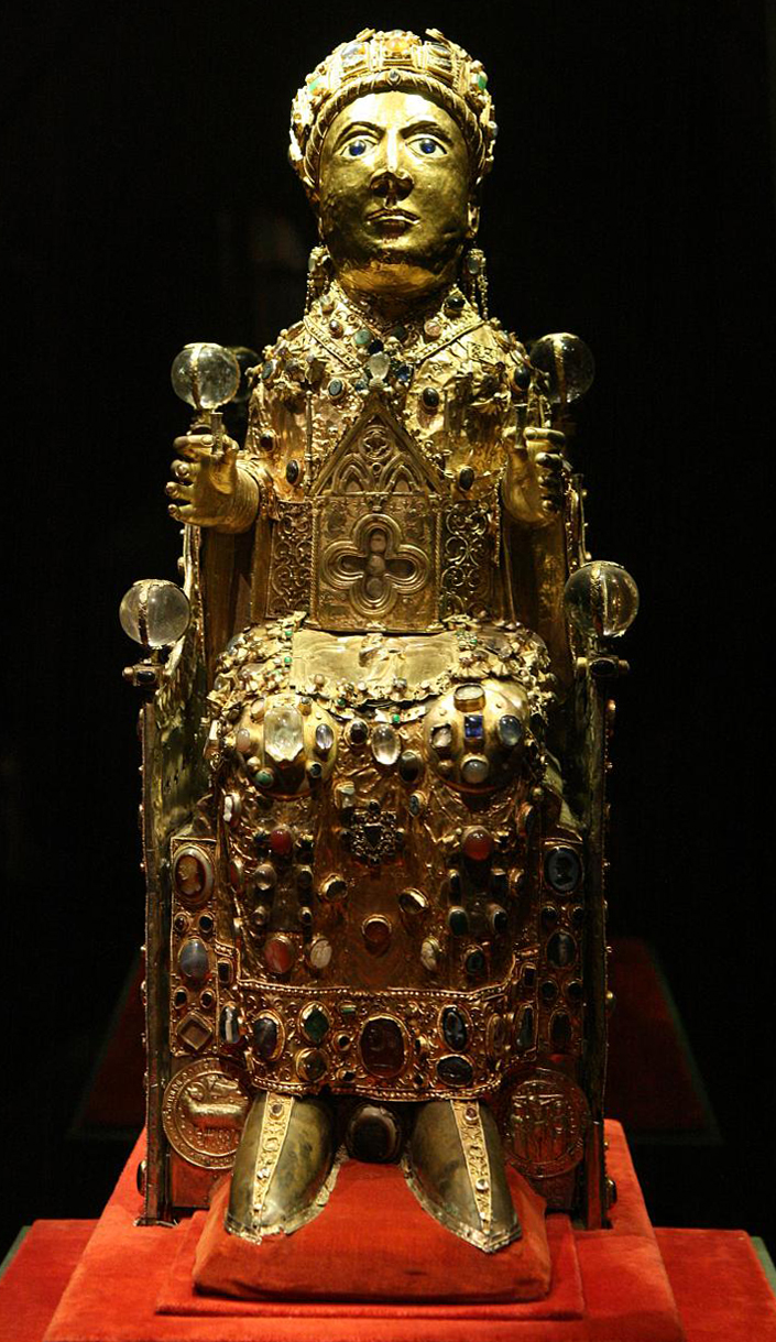 <p>A container for sacred relics, the Reliquary of Ste. Foye is an ornate work of art from the Romanesque period. It features intricate gold craftsmanship and gemstones, serving both a devotional purpose and as a significant symbol of faith in medieval Christian worship. This reliquary is designed to hold the remains of Saint Foy, a young martyr, and is notable for its historical significance and the pilgrims it attracted to the abbey. </p>