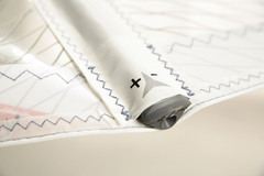 <p>A slat of fiberglass, plastic or wood inserted into a pocket in the sail to help it hold its shape</p>