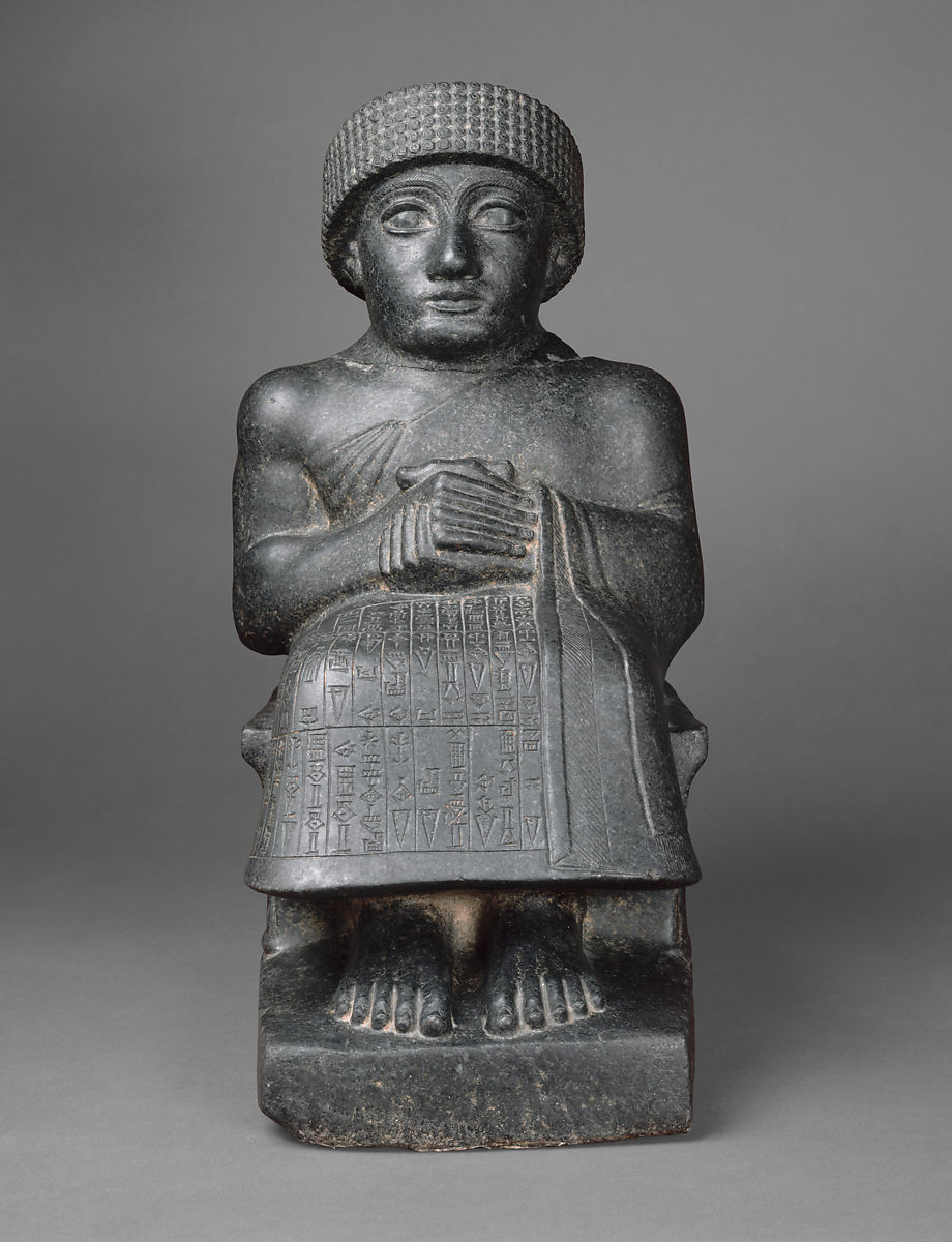 <p><span><strong><em>One of almost 30 nearly identical statues of Gudea</em></strong></span></p>