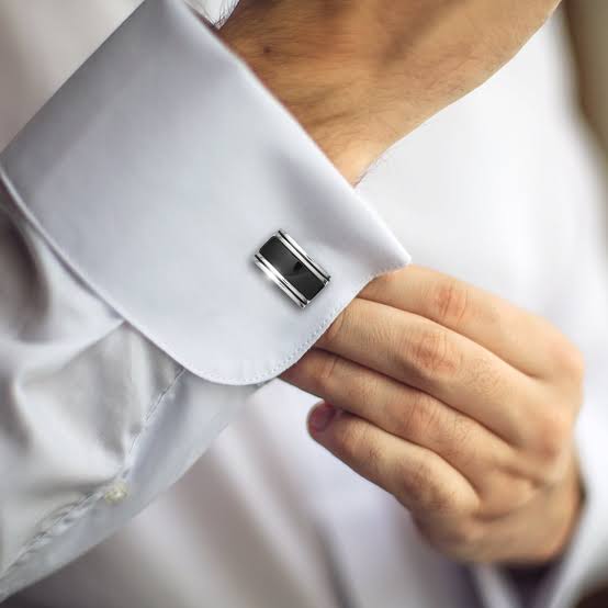 <p>sleeve buttons — He wore silver ______</p>