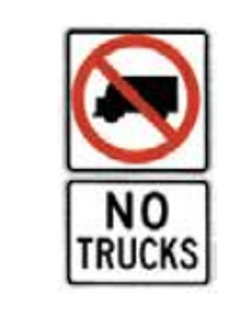<p>A sign indicating that trucks are prohibited from entering this roadway.</p>